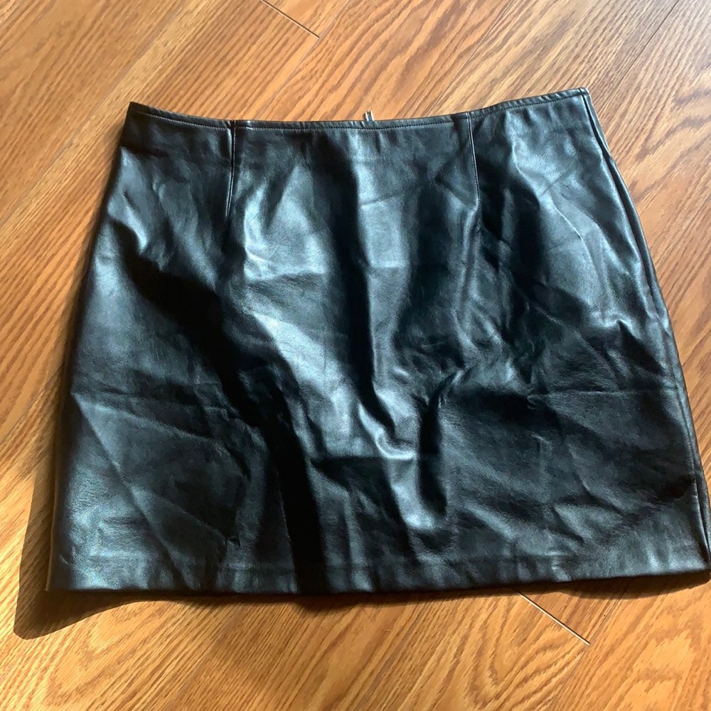 Black leather mini skirt